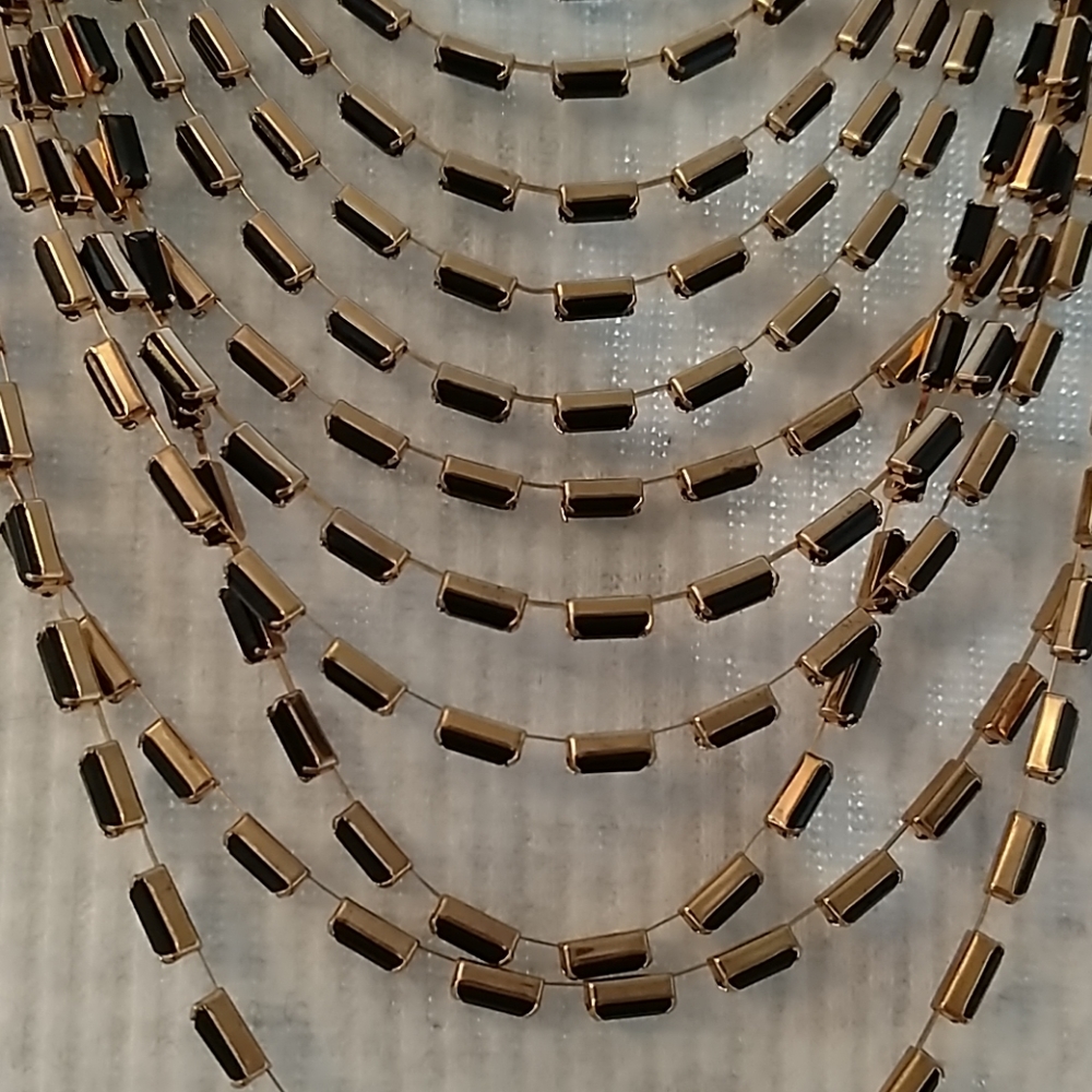 Beautiful black and gold draped necklace